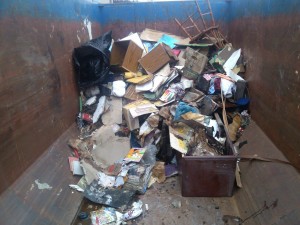 dumpster at wet building